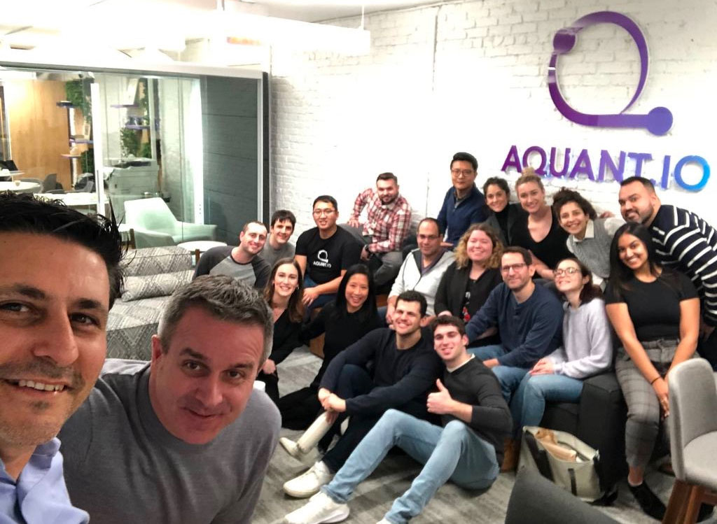 aquant group shot of employees